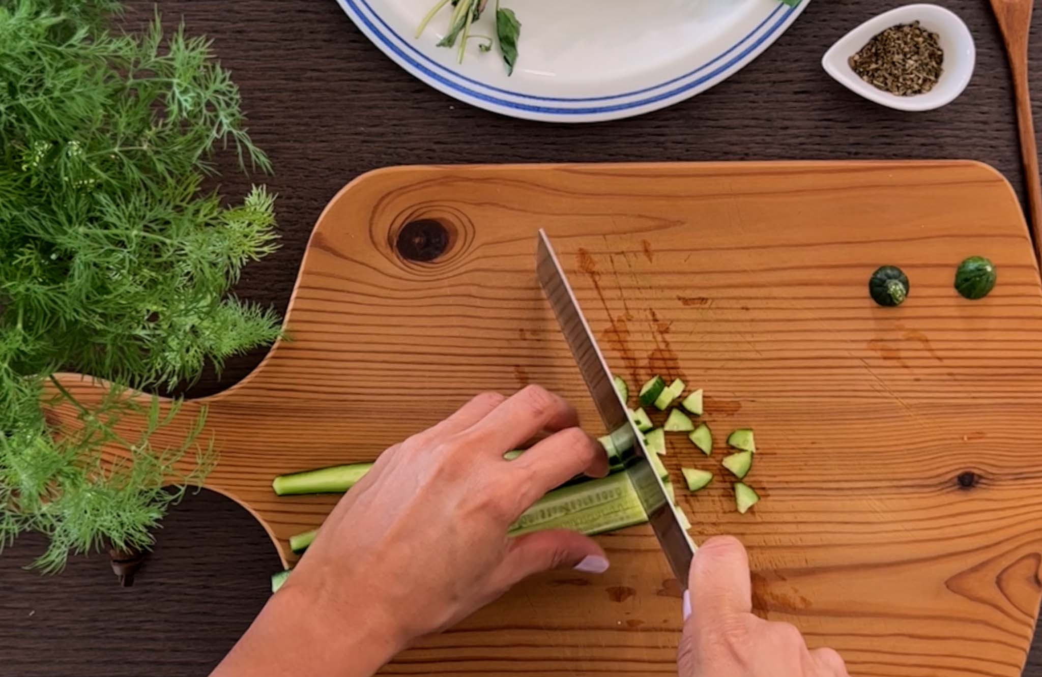 Cutting cucumber into cubes