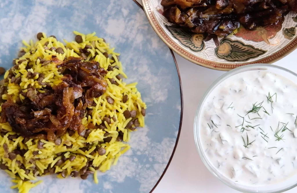 Lentil rice with yogurt cucumber sauce