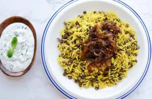 Persian Lentil Rice with yogurt and cucumber sauce