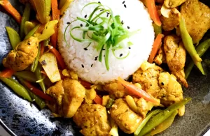 Asian Turmeric Black Pepper Chicken with Tamarind Served with Rice