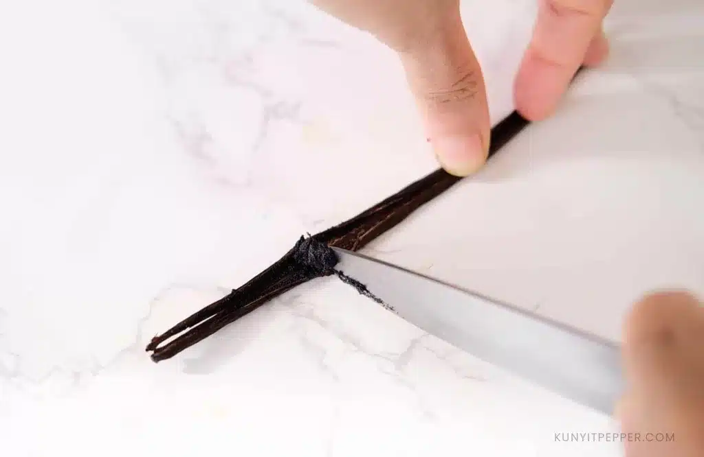 Scrapping Vanilla from the bean using a knife