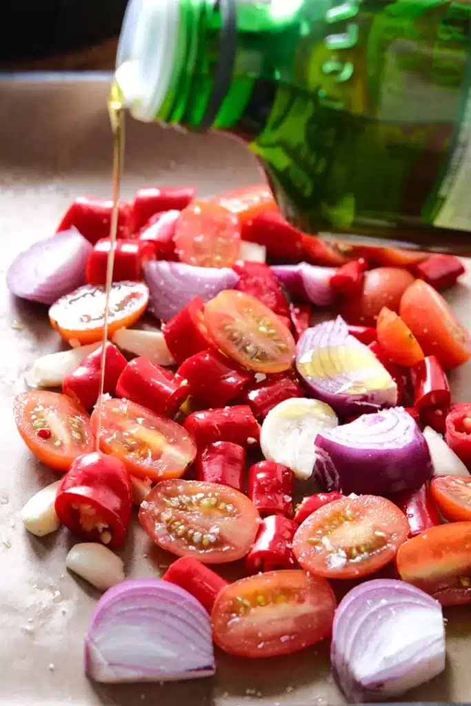 Pouring oil on the ingredients