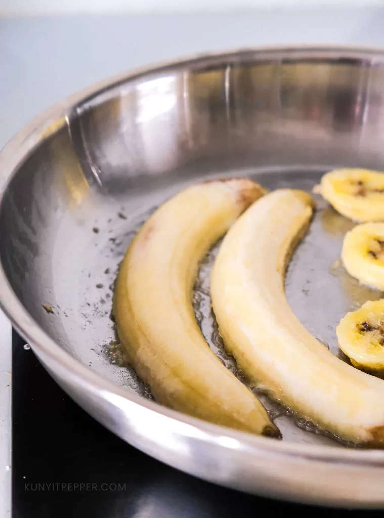 Bananas sizzling on a skillet