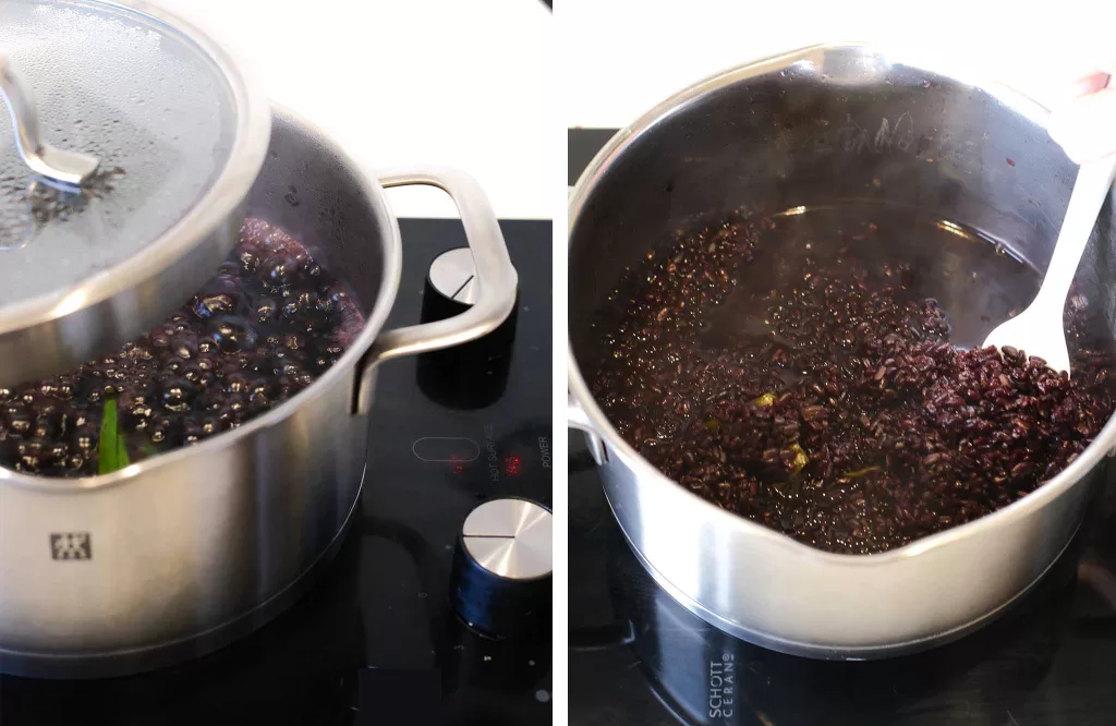 loosely covered pot with black rice in it and stirring black rice