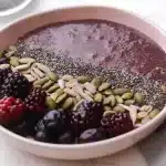 Healthy Black Sticky Rice bowl with seeds and berries