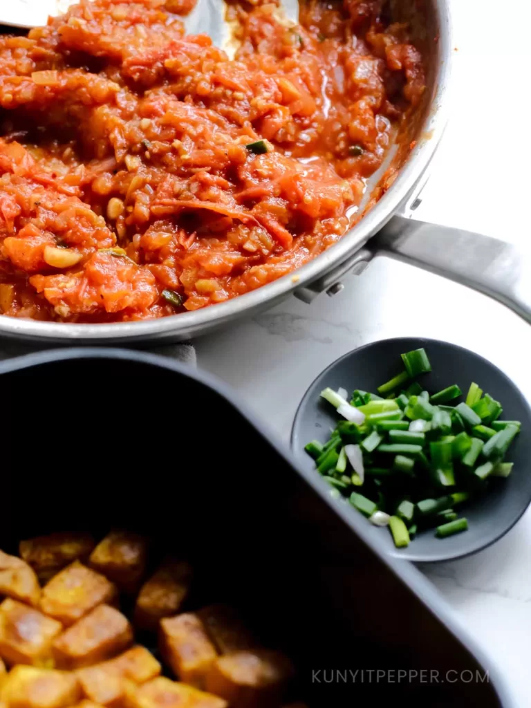 Airfried tofu with tomato sauce in a pan