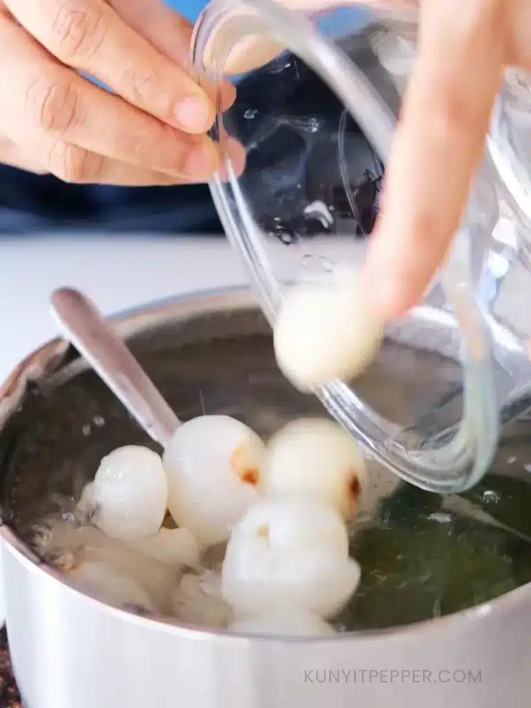 Adding Lychees into the pot